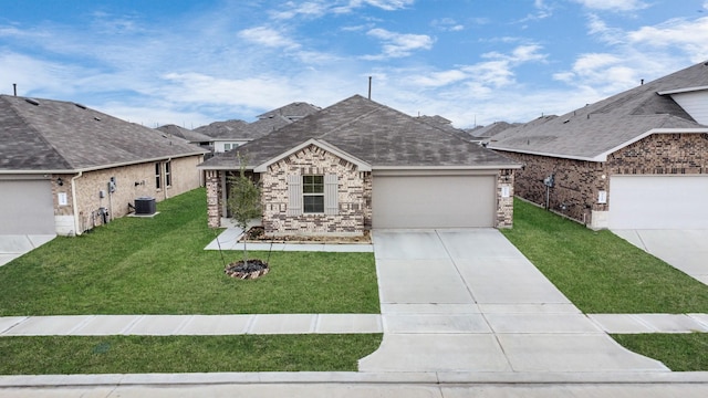 ranch-style home featuring central air condition unit, a front lawn, and a garage