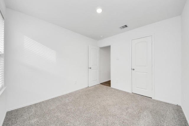 empty room with carpet floors