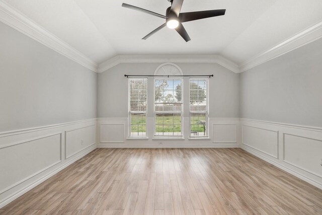 unfurnished room with ornamental molding, light hardwood / wood-style flooring, ceiling fan, and lofted ceiling