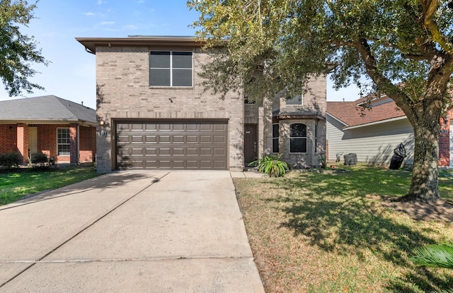 view of front property featuring a garage, central AC, and a front lawn