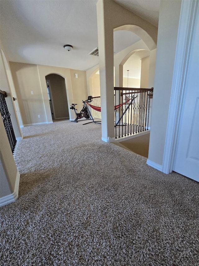 spare room featuring carpet floors