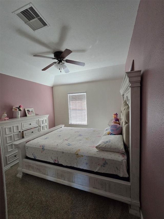 carpeted bedroom featuring vaulted ceiling and ceiling fan