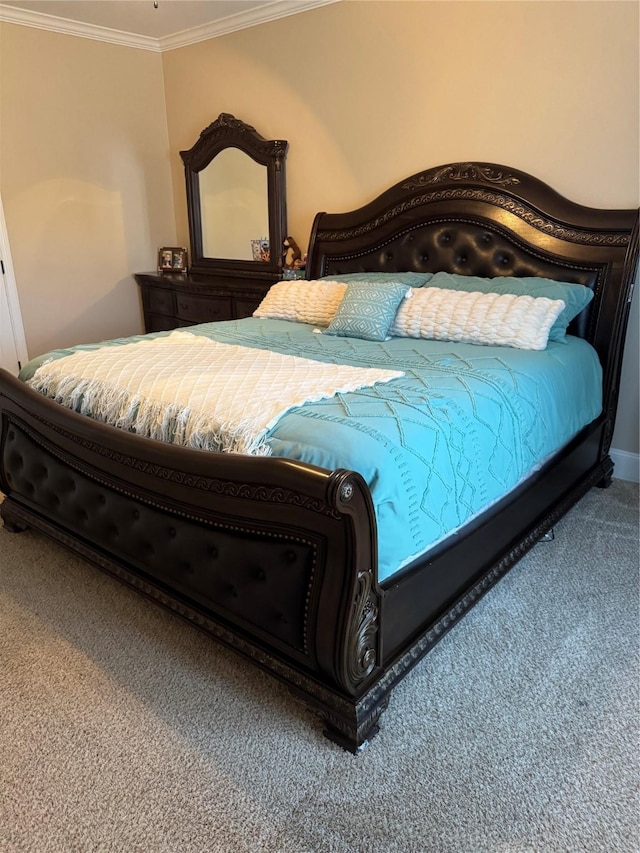 carpeted bedroom featuring ornamental molding