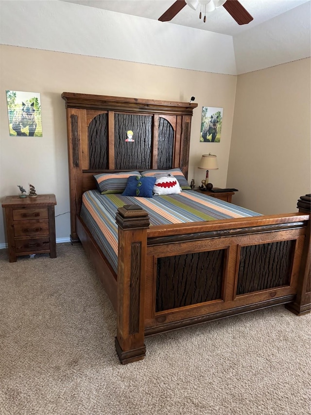 bedroom featuring light carpet, vaulted ceiling, and ceiling fan