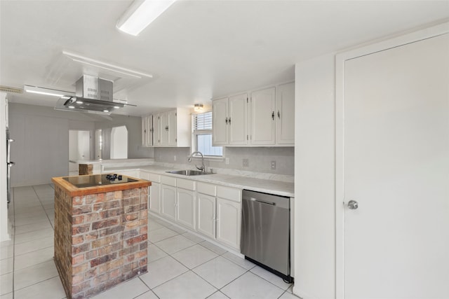 kitchen featuring black electric stovetop, white cabinets, stainless steel dishwasher, and sink