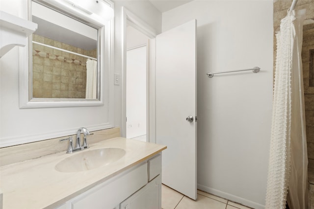 bathroom featuring tile patterned floors, vanity, and a shower with shower curtain