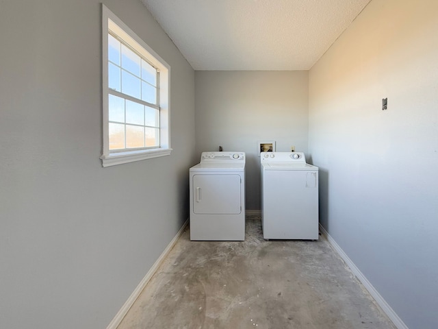 clothes washing area with independent washer and dryer