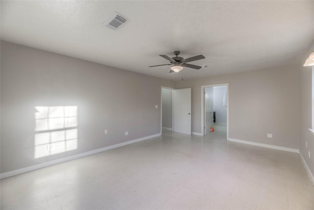 unfurnished room with ceiling fan