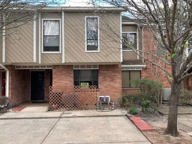 back of property featuring a patio