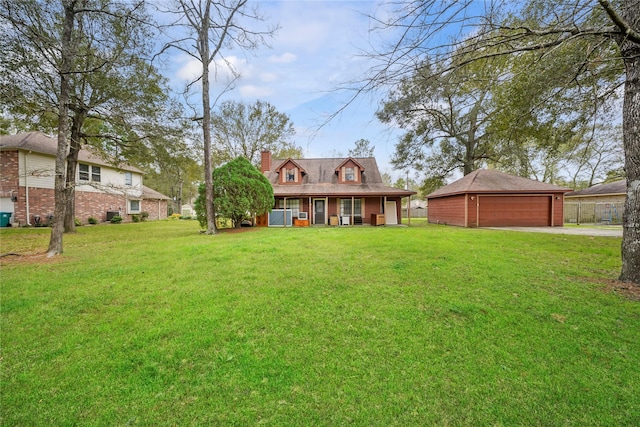 cape cod house featuring a front yard, covered porch, and a garage