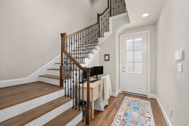 entrance foyer with hardwood / wood-style floors