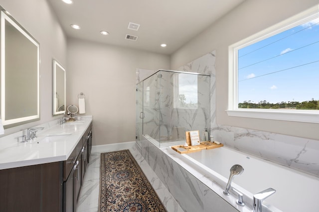 bathroom with plus walk in shower and vanity