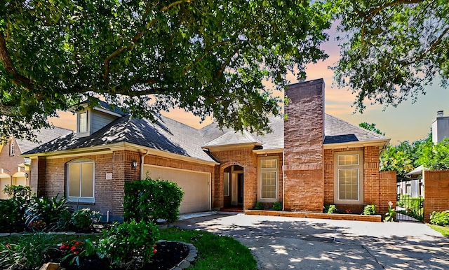 view of front of property with a garage