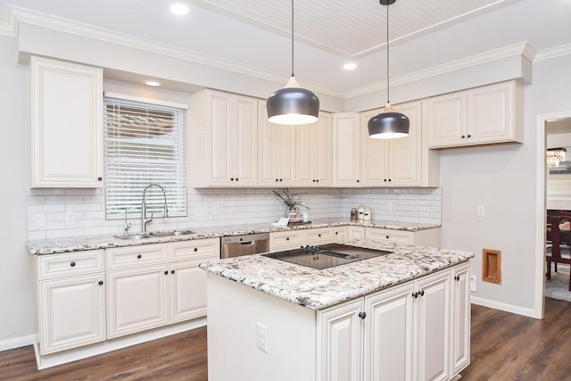 kitchen with stainless steel dishwasher, decorative light fixtures, white cabinetry, and sink