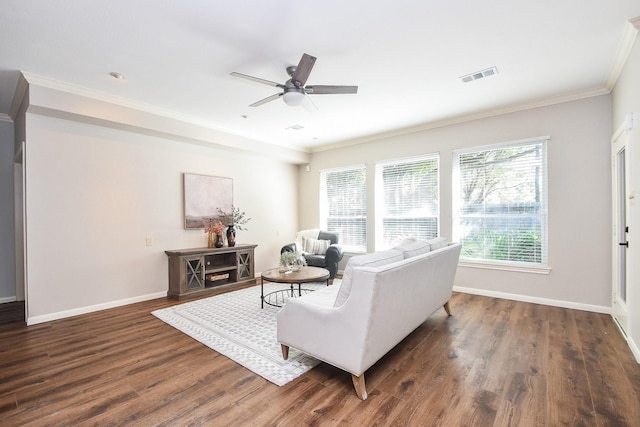 living room featuring ceiling fan, dark hardwood / wood-style flooring, and crown molding