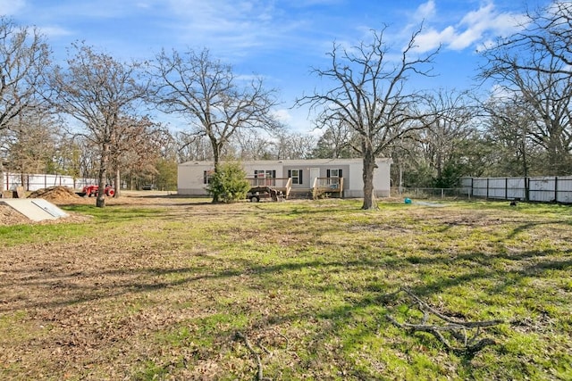 view of yard featuring a deck