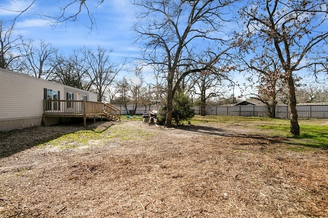 view of yard with a deck