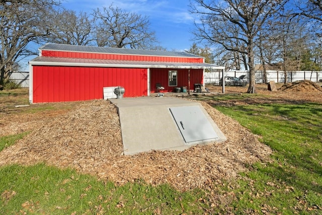 view of storm shelter featuring an outdoor structure