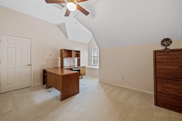 carpeted office featuring ceiling fan and vaulted ceiling