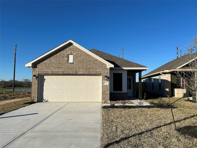 ranch-style house featuring driveway, an attached garage, a shingled roof, and brick siding