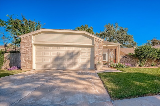 ranch-style home with a garage and a front lawn