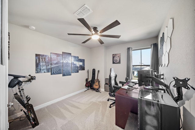 office featuring light colored carpet and ceiling fan