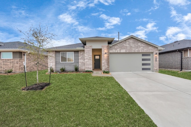 view of front facade with a front lawn and a garage