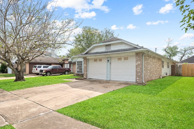 view of home's exterior with a lawn and a garage