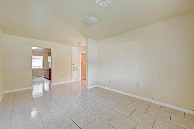 view of tiled empty room