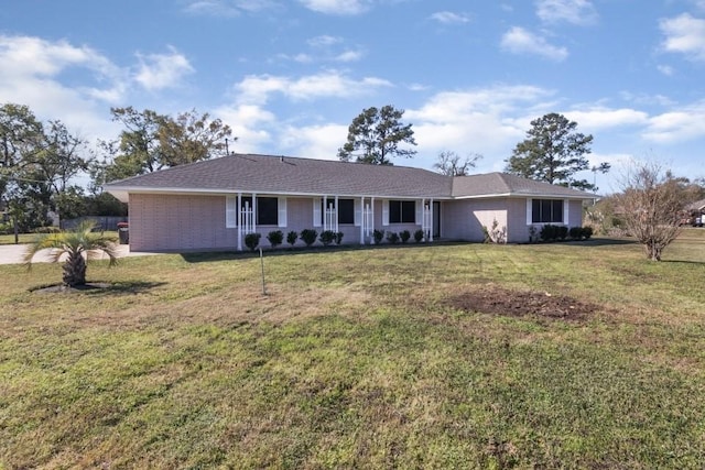 single story home with a front yard