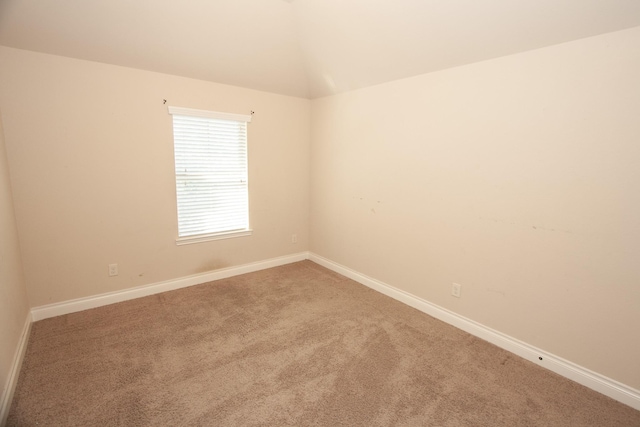 unfurnished room featuring carpet flooring