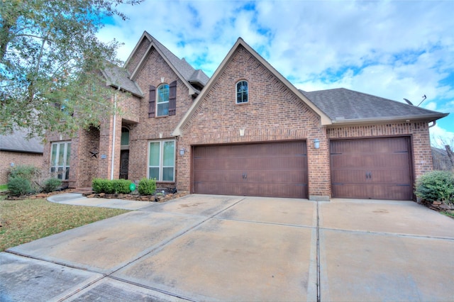 view of front of property with a garage