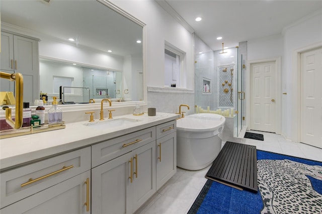 bathroom with plus walk in shower, vanity, tile patterned floors, and ornamental molding