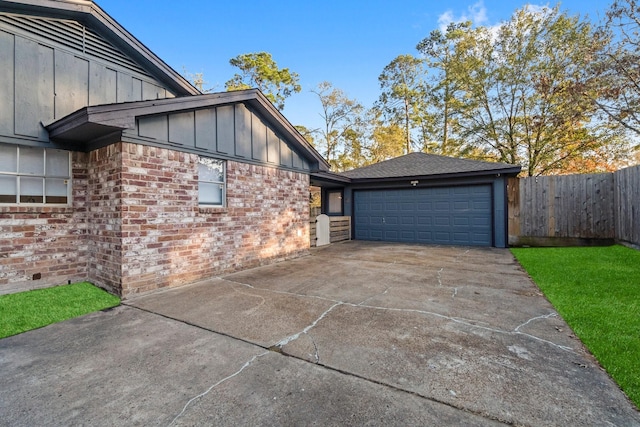 exterior space with a garage