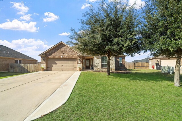 ranch-style house with a garage and a front yard