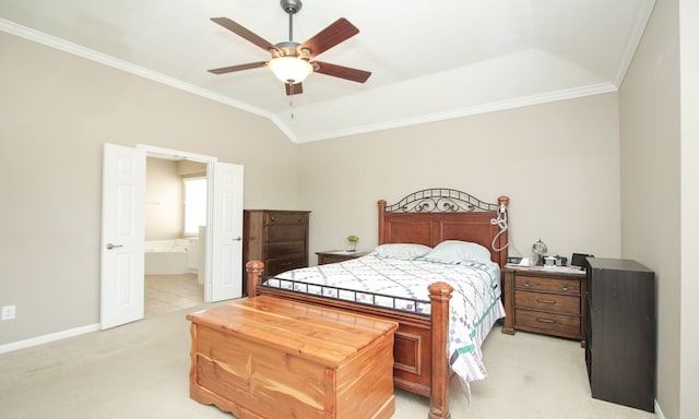 carpeted bedroom with ensuite bath, ceiling fan, and crown molding