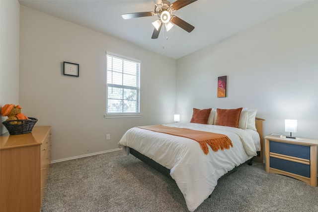 bedroom with ceiling fan and carpet