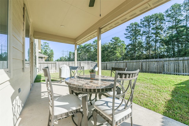 view of patio / terrace featuring ceiling fan