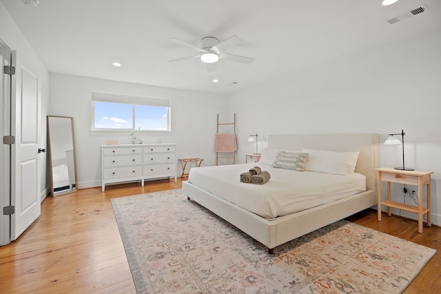 bedroom featuring ceiling fan and light wood-type flooring