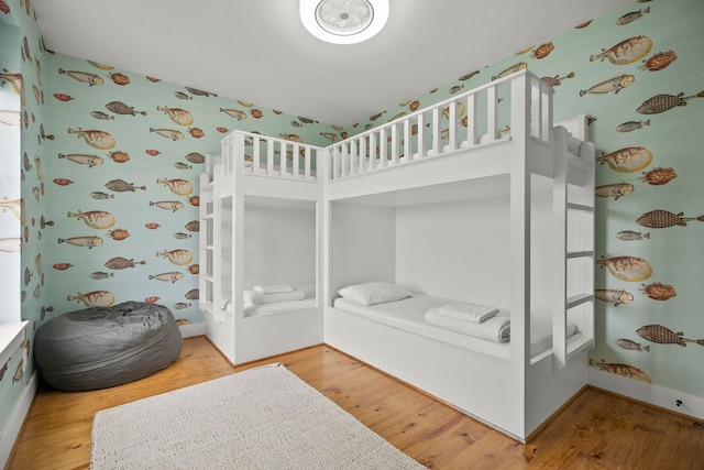 bedroom featuring wood-type flooring