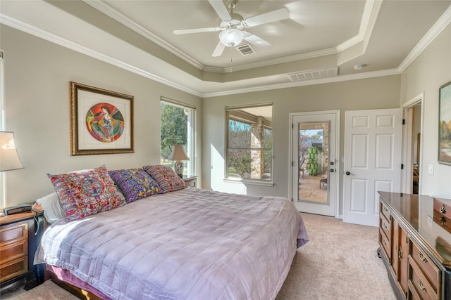 carpeted bedroom featuring a raised ceiling, ceiling fan, access to exterior, and crown molding