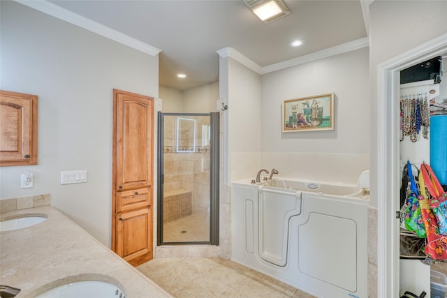 bathroom with tile patterned flooring, shower with separate bathtub, vanity, and crown molding