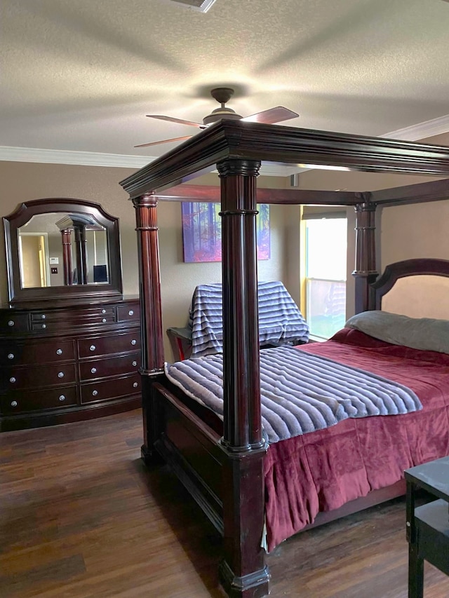 bedroom with ornamental molding, a ceiling fan, a textured ceiling, and wood finished floors