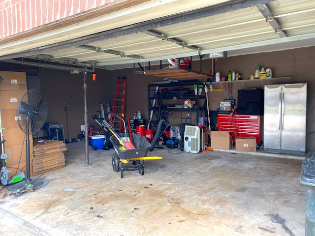 garage with freestanding refrigerator