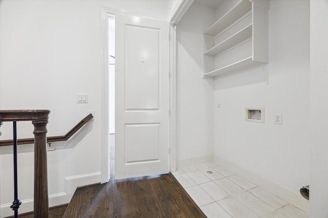 washroom featuring washer hookup and light wood-type flooring