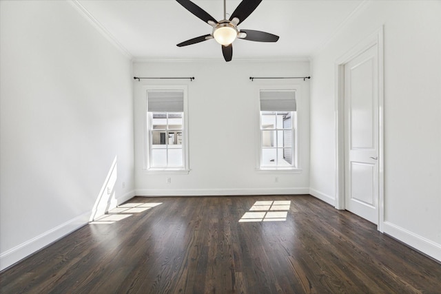 spare room with dark hardwood / wood-style flooring, ceiling fan, and crown molding