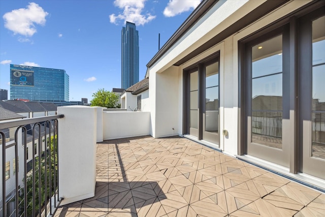 view of patio with a balcony