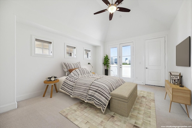 bedroom with access to exterior, french doors, light colored carpet, ceiling fan, and lofted ceiling