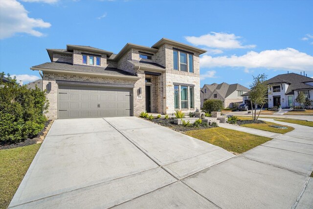 prairie-style home with a garage