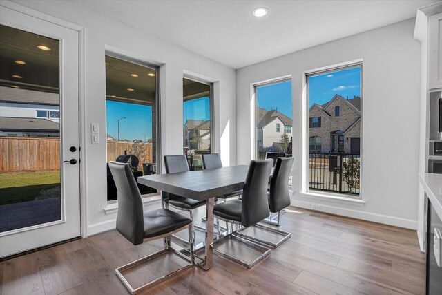 dining room with hardwood / wood-style floors